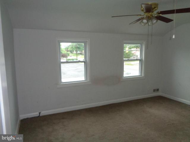 336 Stemmers Run Road Baltimore, MD 21221 - Photo 10 of 13 an empty room with a window