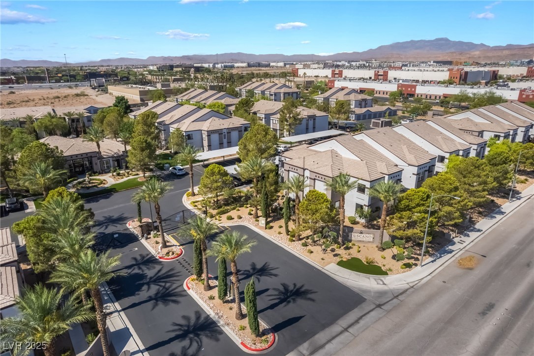 7255 West Sunset Road, Unit 1148 Las Vegas, NV 89113 - Photo 42 of 62 Aerial perspective of suburban area with mountains