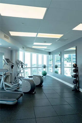 a view of a room with gym equipment