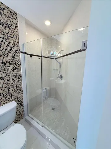a bathroom with a bathtub and a sink