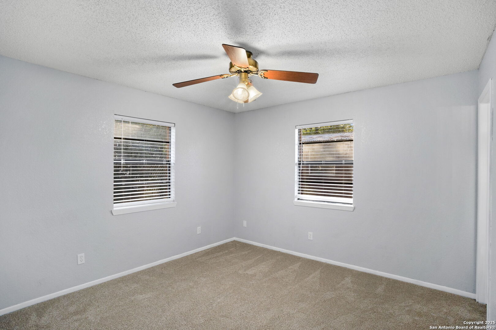 127 Harless Way Center Point, TX 78010 - Photo 16 of 25 a view of an empty room with a window