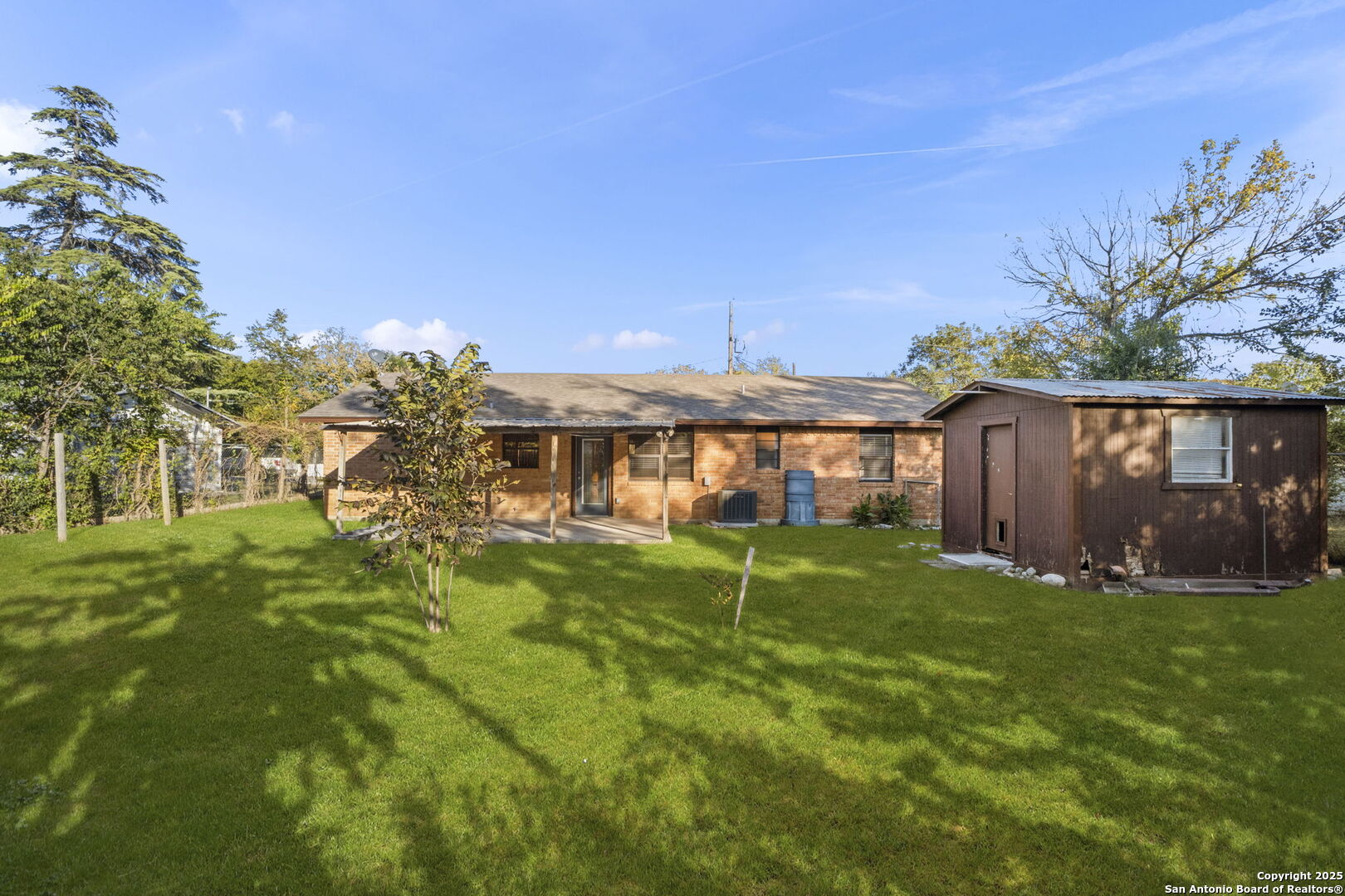 127 Harless Way Center Point, TX 78010 - Photo 23 of 25 a backyard of a house with table and chairs