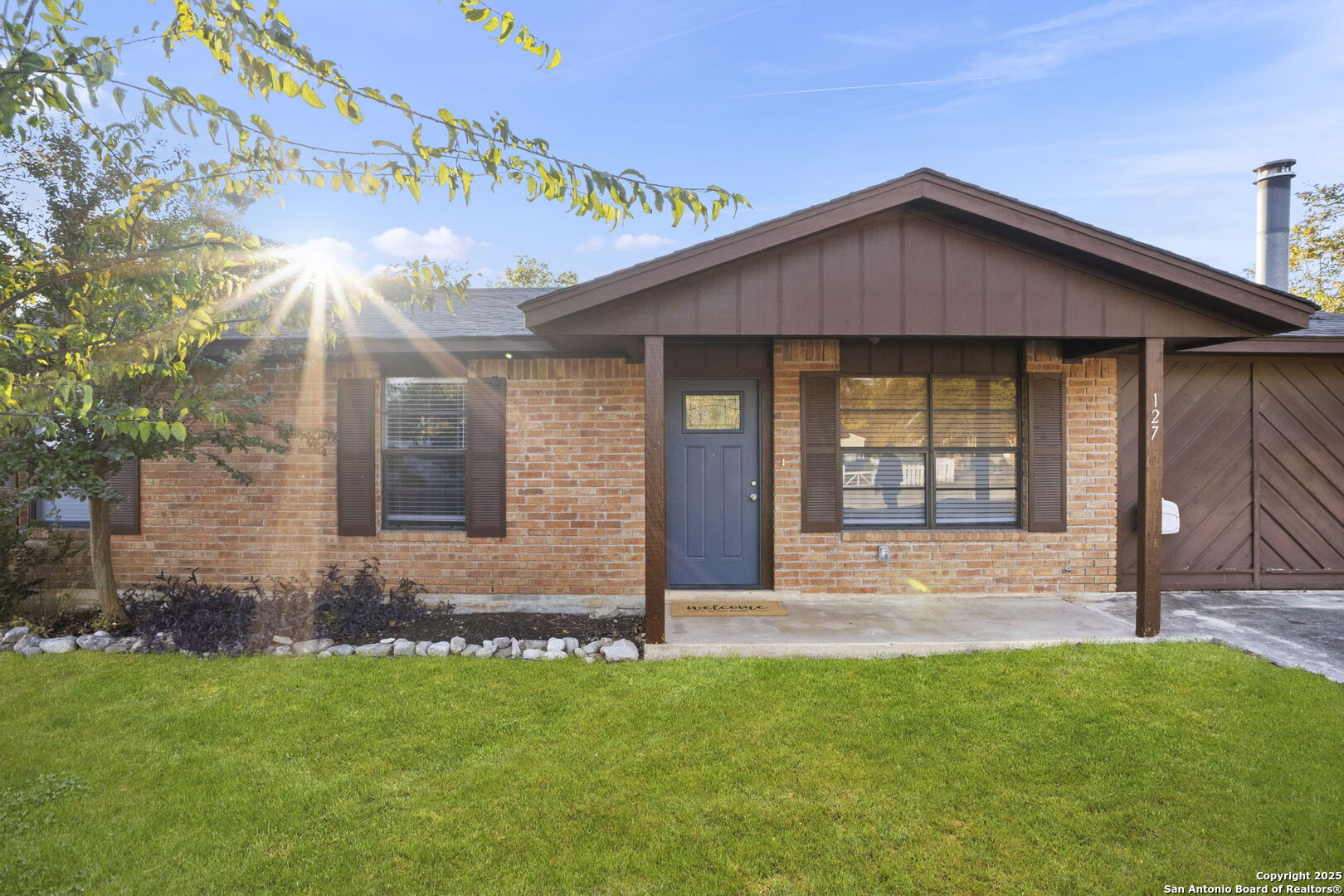 127 Harless Way Center Point, TX 78010 - Photo 4 of 25 a front view of a house with a yard