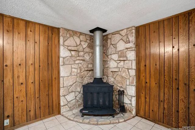 a view of entryway with wooden walls