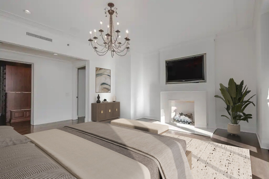 270 East Pearson Street, Unit 701801 Chicago, IL 60611 - Photo 10 of 19 a bedroom with a bed and a television