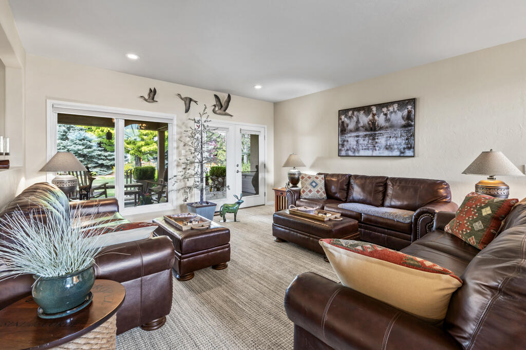 15103 6260th Road Montrose, CO 81403 - Photo 13 of 54 a living room with furniture and a large window