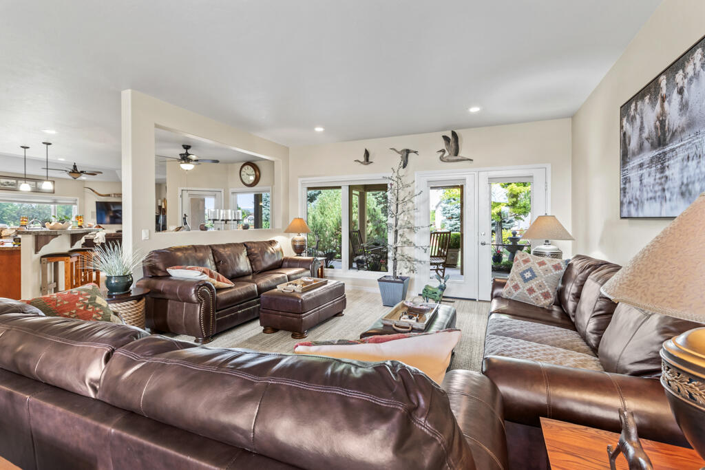 15103 6260th Road Montrose, CO 81403 - Photo 14 of 54 a living room with furniture and large windows