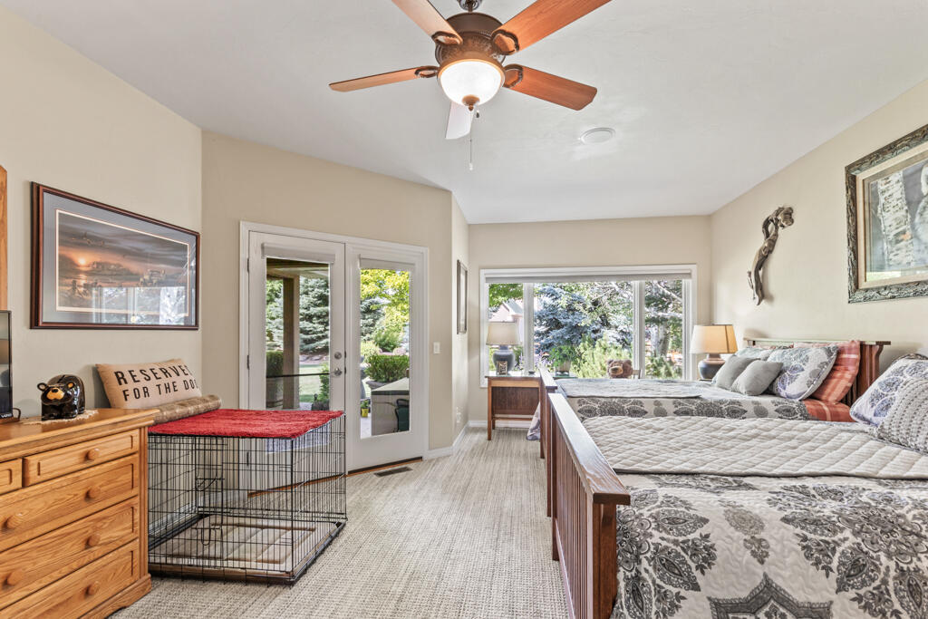 15103 6260th Road Montrose, CO 81403 - Photo 24 of 54 a living room with furniture and a floor to ceiling window