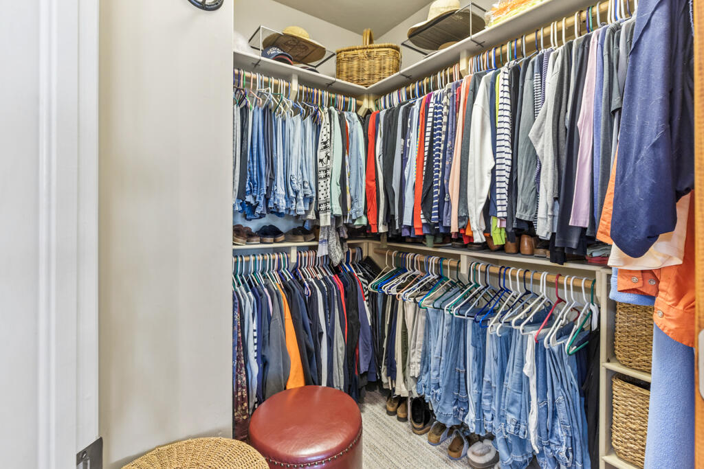 15103 6260th Road Montrose, CO 81403 - Photo 28 of 54 a view of walk in closet with clothes
