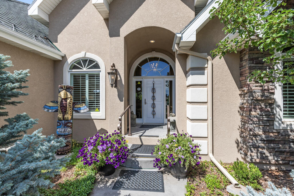 15103 6260th Road Montrose, CO 81403 - Photo 52 of 54 a front view of a house with a yard