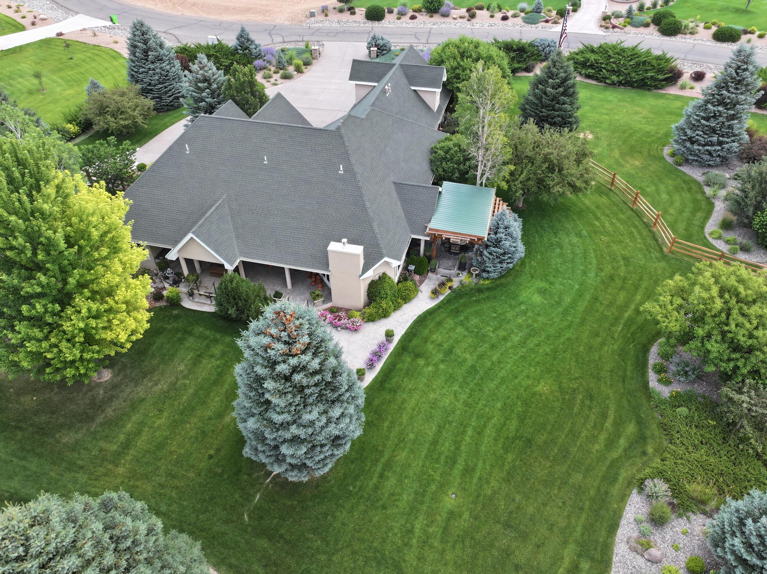 15103 6260th Road Montrose, CO 81403 - Photo 8 of 54 an aerial view of a house