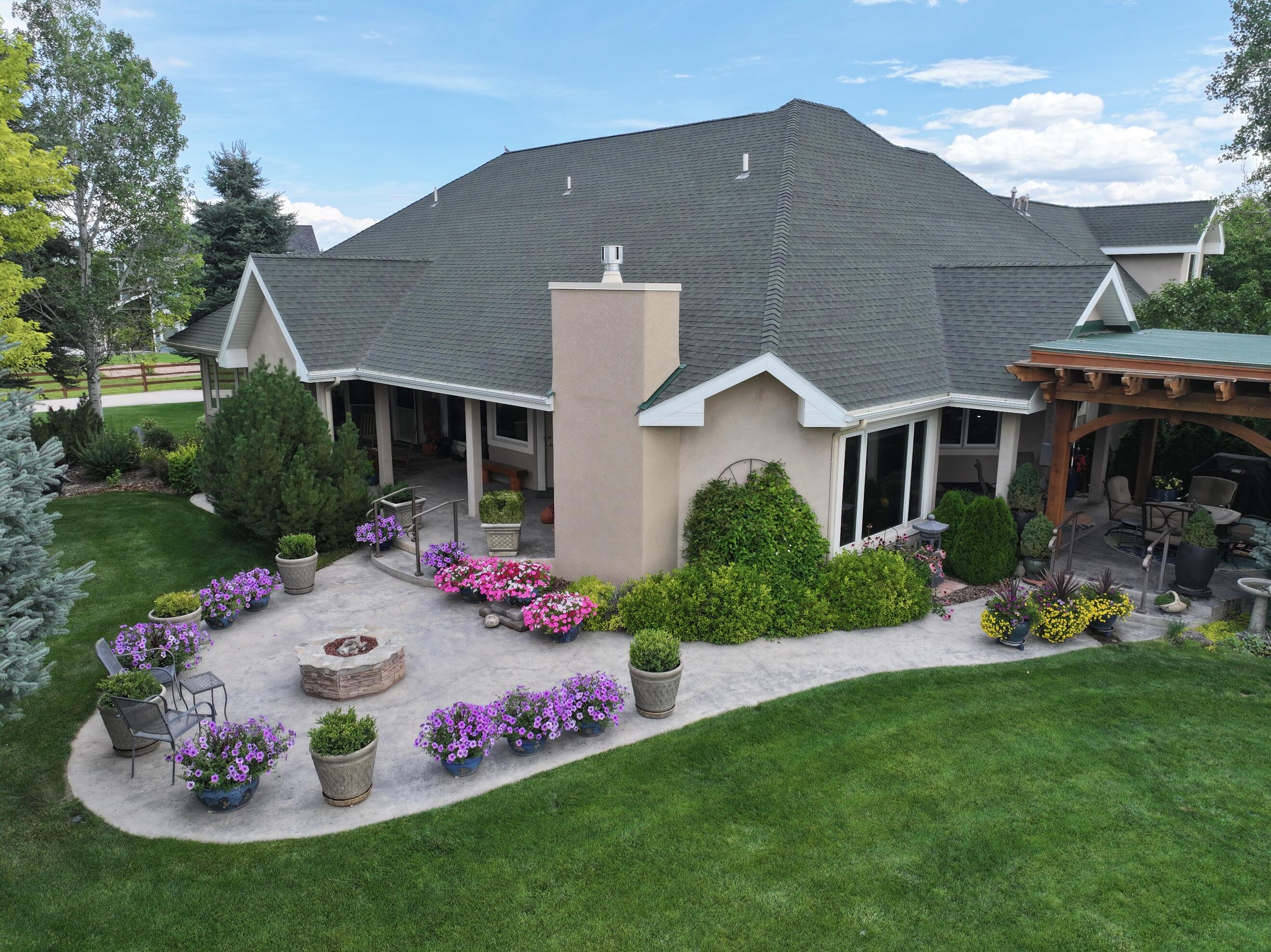15103 6260th Road Montrose, CO 81403 - Photo 10 of 54 a view of a house with a yard