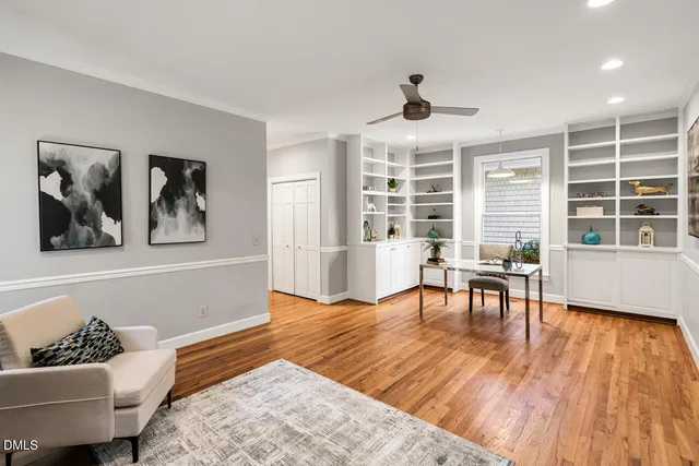 a big room with wooden floor and closet