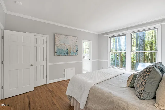 a view of an empty room and a window