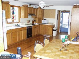 103 Mountainview Road Ewing, NJ 08628 - Photo 3 of 5 a kitchen with a sink appliances and cabinets