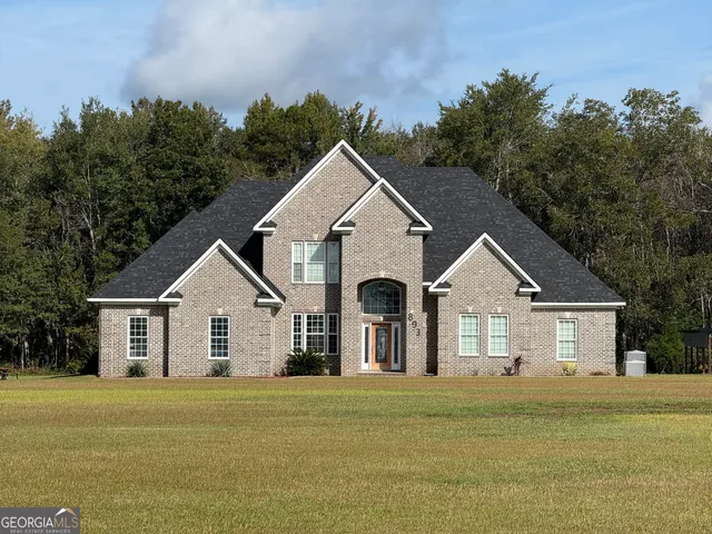 a view of outdoor space yard and front view of a house