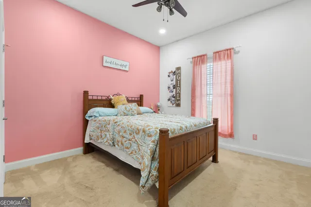 a bathroom with a sink toilet vanity and tub