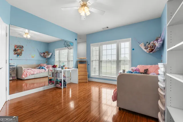 a view of livingroom with furniture wooden floor and window