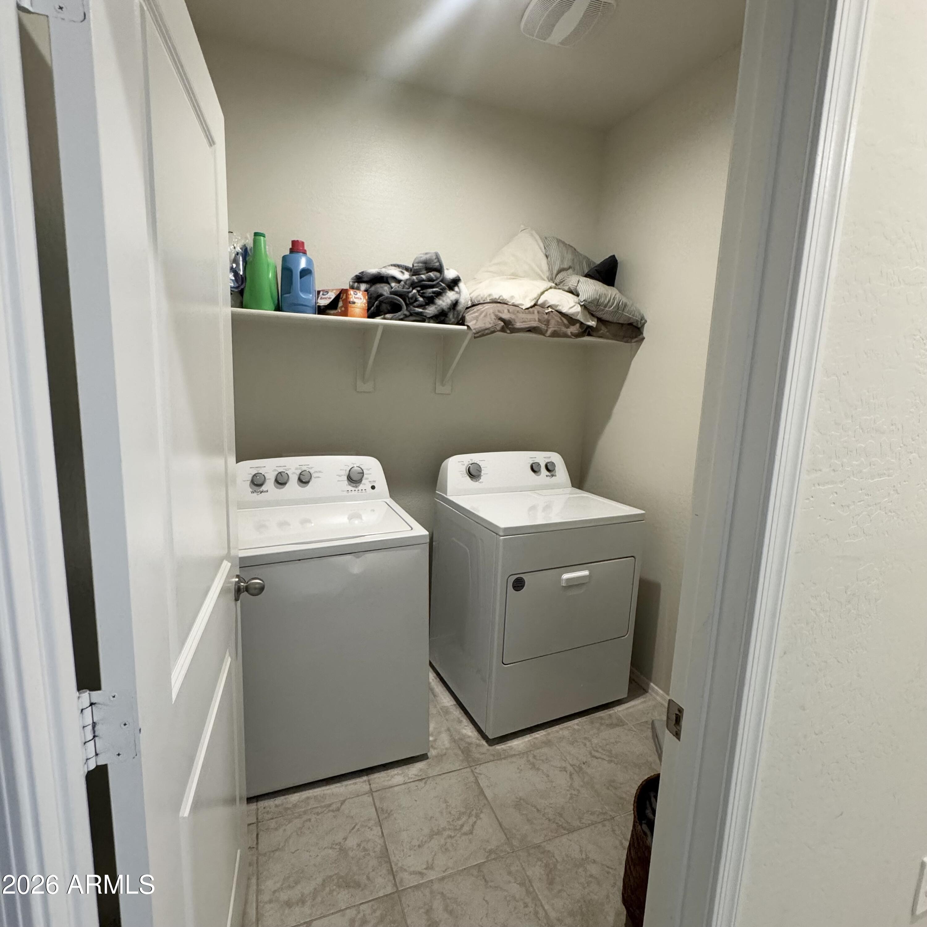 5208 East Emery Road San Tan Valley, AZ 85143 - Photo 22 of 30 a utility room with dryer and washer