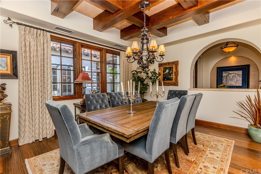 17 Cassis Circle Rancho Mirage, CA 92270 - Photo 26 of 75 a view of a dining room with furniture and a chandelier