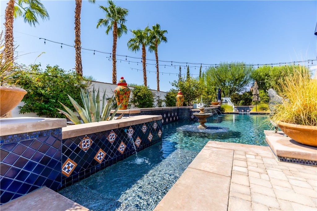 17 Cassis Circle Rancho Mirage, CA 92270 - Photo 62 of 75 a view of a chairs and table on the patio