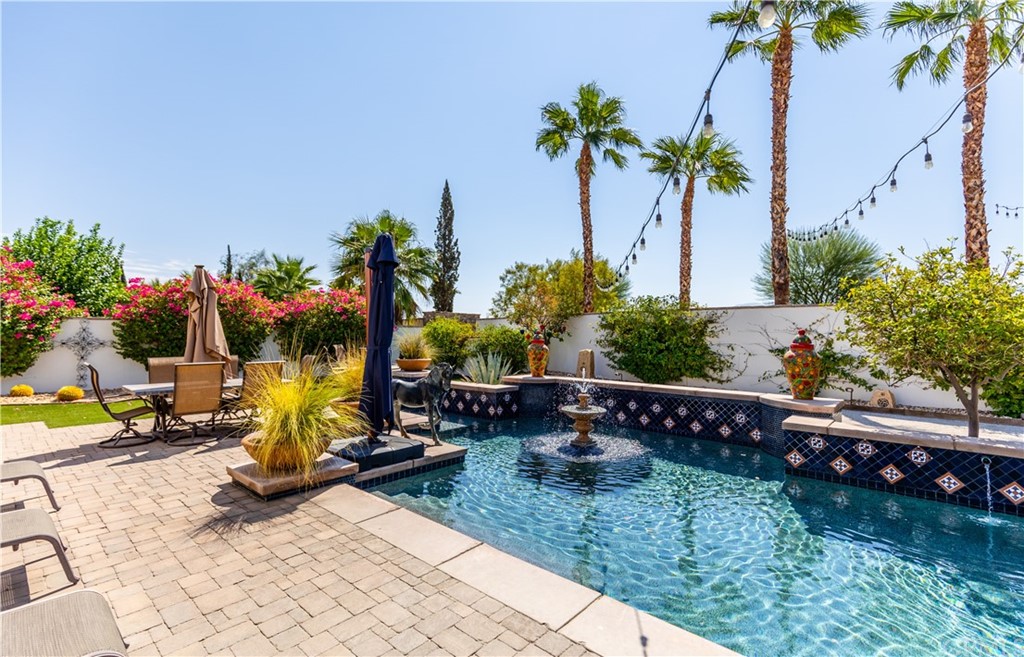 17 Cassis Circle Rancho Mirage, CA 92270 - Photo 63 of 75 a view of a backyard with plants and palm trees
