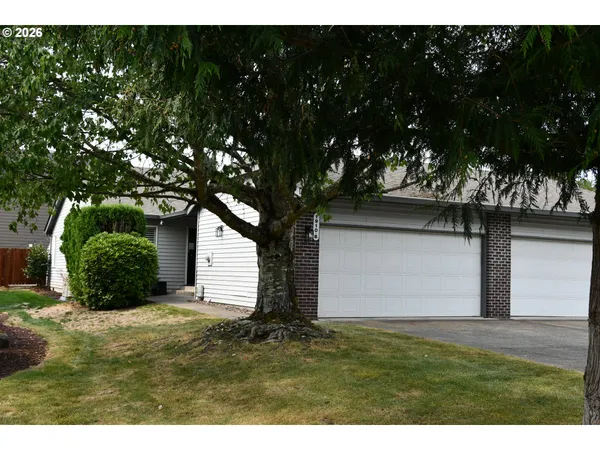 a view of outdoor space yard and garage