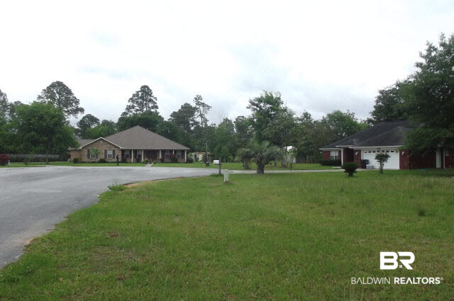10 Starling Court Lillian, AL 36549 - Photo 5 of 6 Front of the lot looking up the street in the cul-de-sac