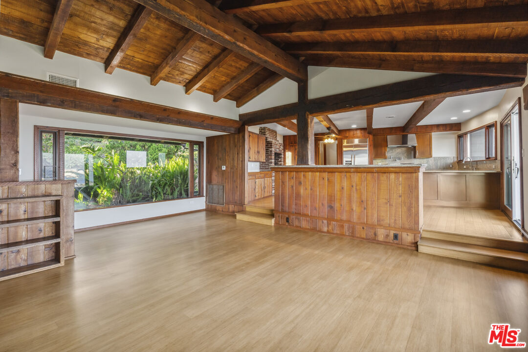 3217 Colony View Circle Malibu, CA 90265 - Photo 3 of 23 a view of a room with wooden floor and windows