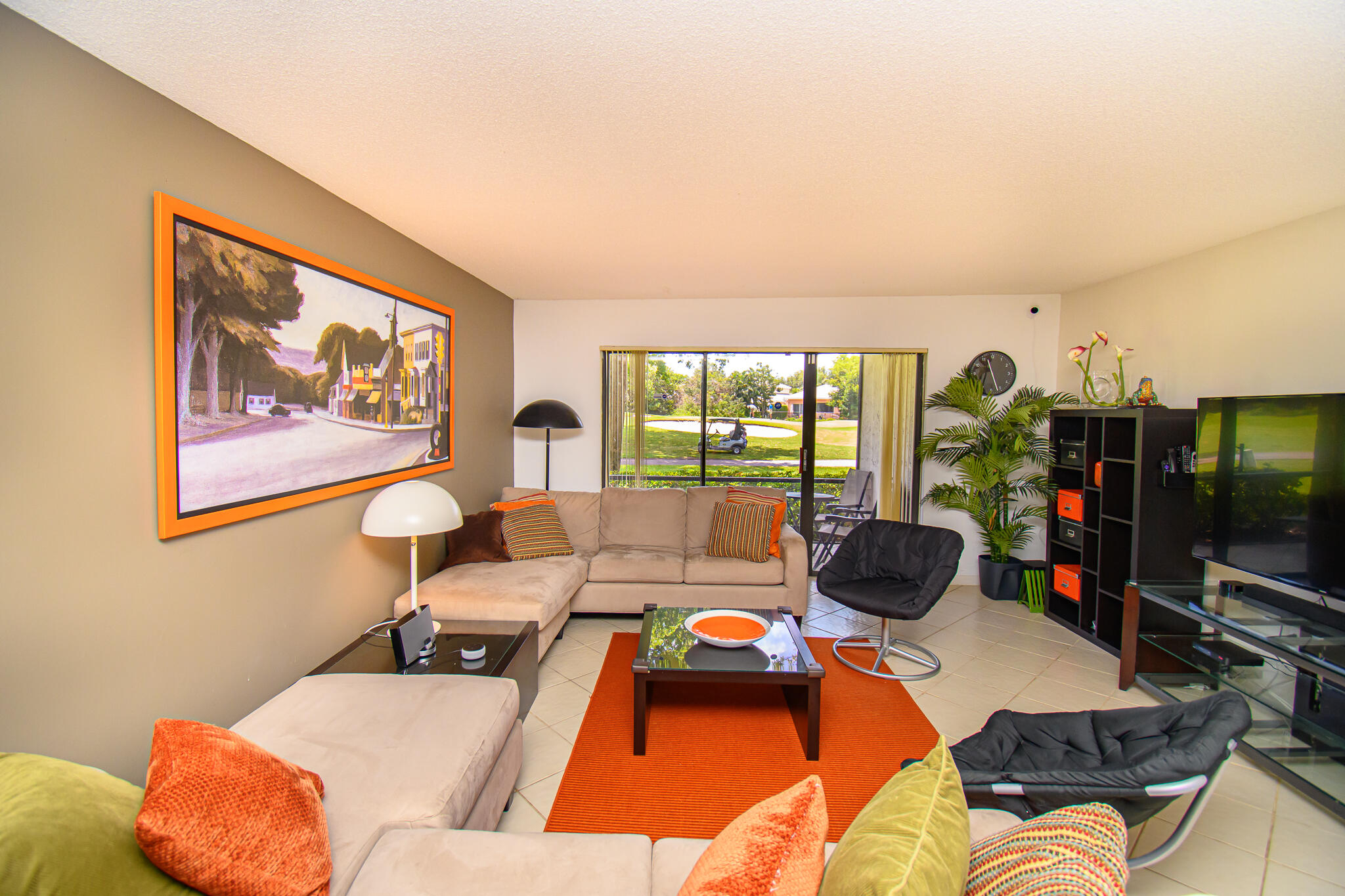 8334 Cypress Lane, Unit 1A Boca Raton, FL 33433 - Photo 3 of 42 DSC_5775living area w golf view