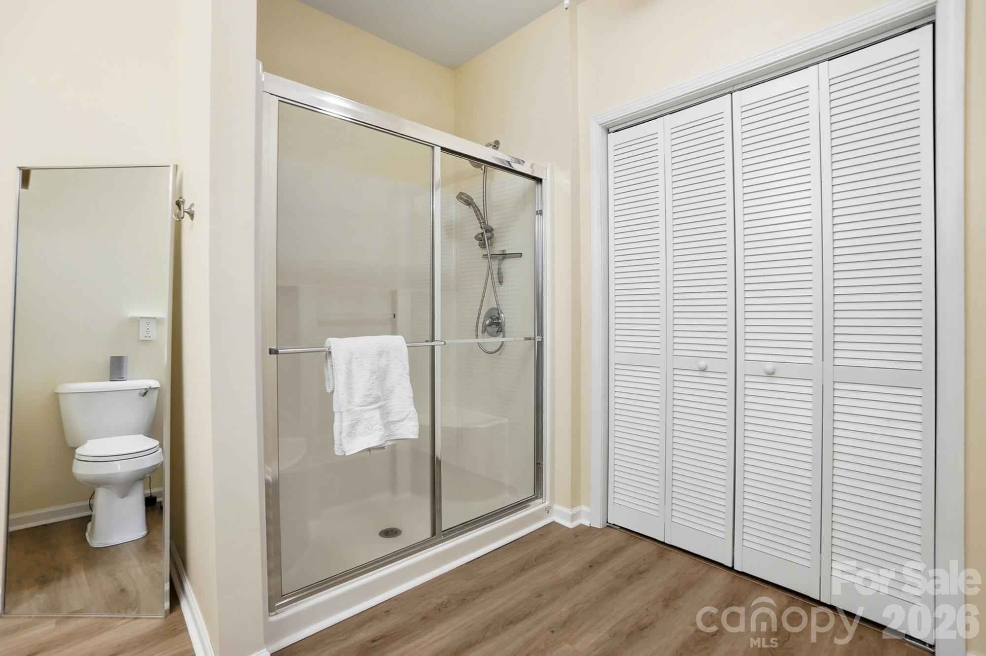 1667 Onyx Ridge Fort Mill, SC 29708 - Photo 20 of 25 a bathroom with a shower and a toilet
