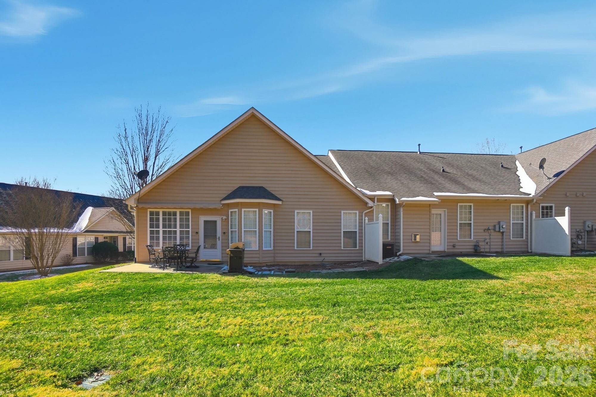 1667 Onyx Ridge Fort Mill, SC 29708 - Photo 23 of 25 a front view of house with yard and green space