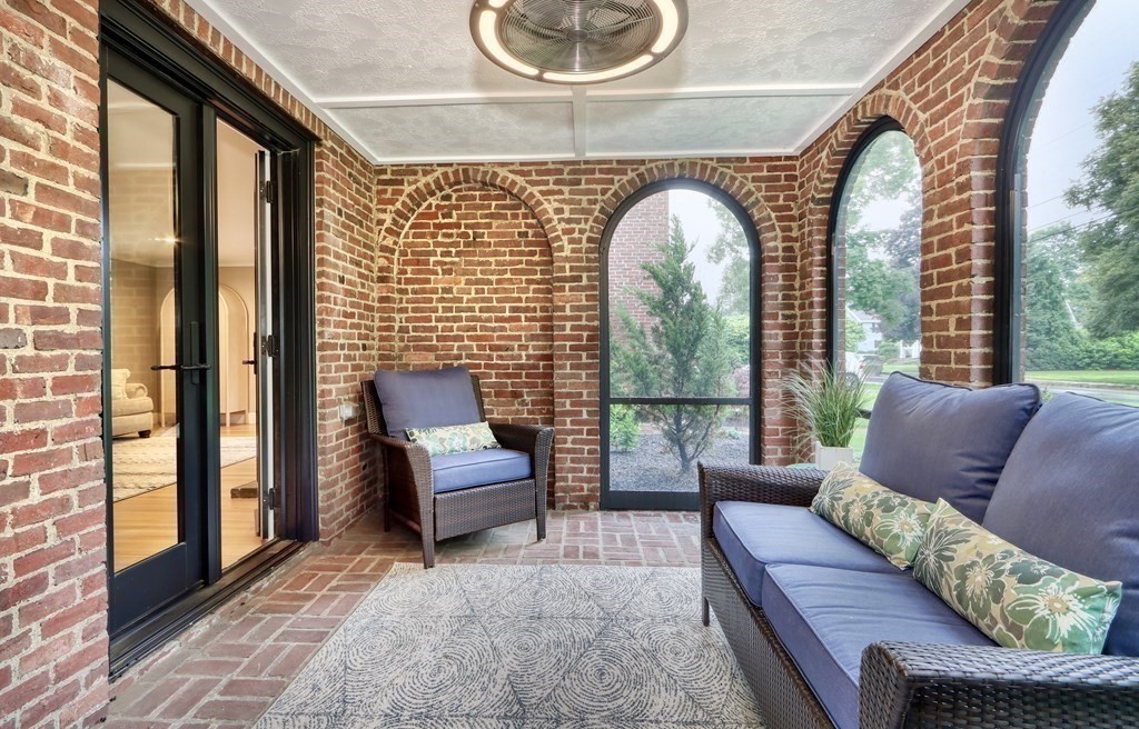 27 Cabot Street Winchester, MA 01890 - Photo 21 of 42 a living room with furniture and a large window