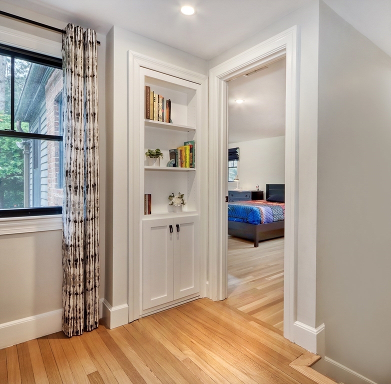 27 Cabot Street Winchester, MA 01890 - Photo 29 of 42 a bedroom with a bed and a window
