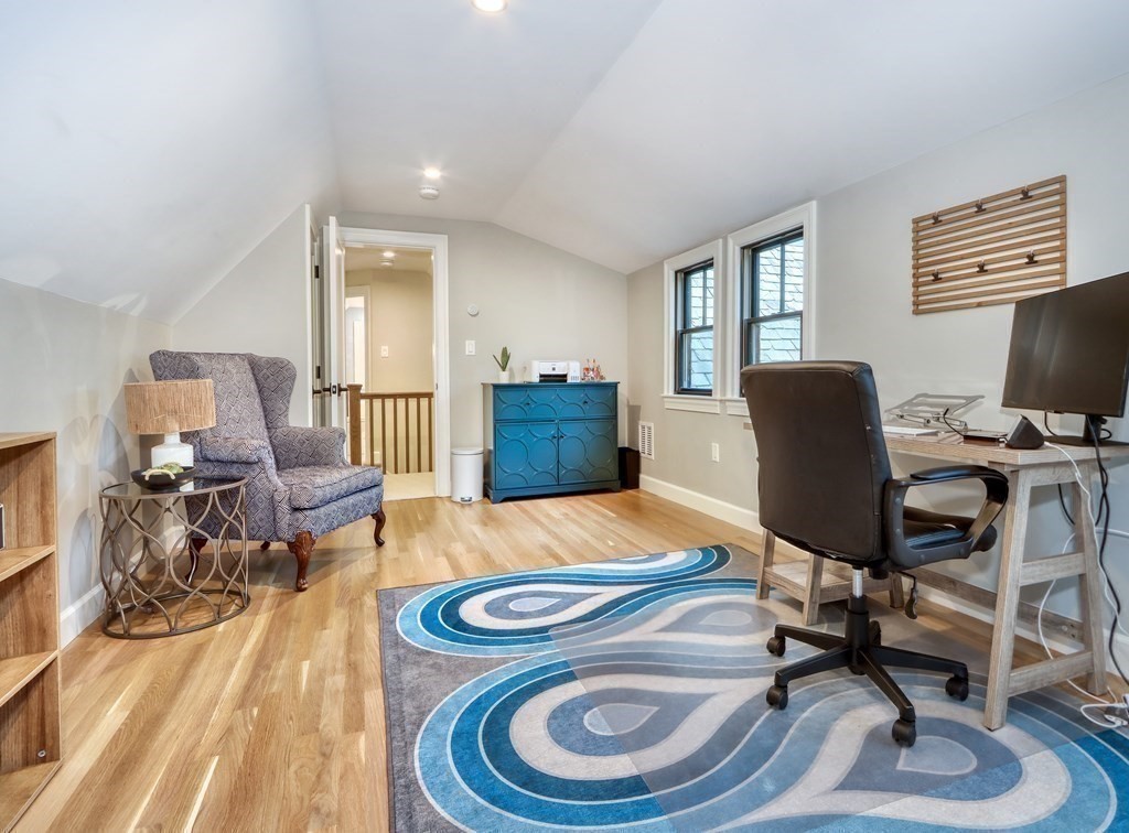 27 Cabot Street Winchester, MA 01890 - Photo 36 of 42 a work room with furniture and wooden floor