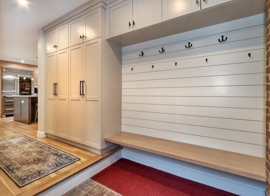 27 Cabot Street Winchester, MA 01890 - Photo 4 of 42 a view of kitchen with refrigerator and stove