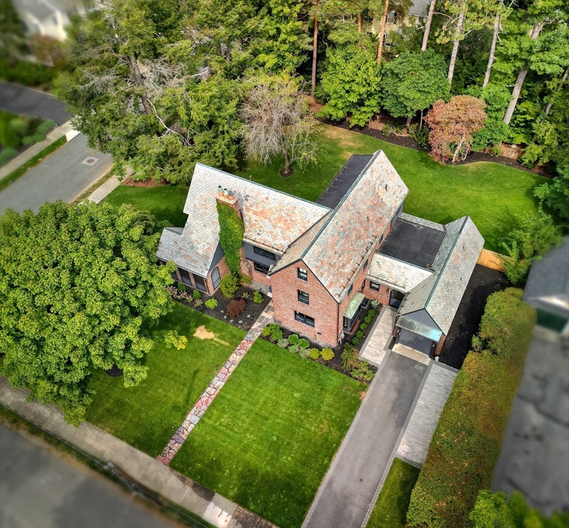 27 Cabot Street Winchester, MA 01890 - Photo 42 of 42 an aerial view of a house with a garden and swimming pool