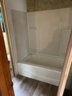 a bathroom with a bathtub