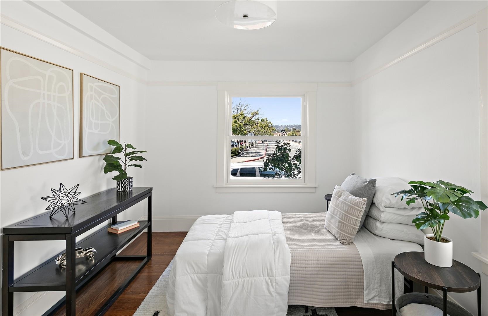 1436 Delaware Street Berkeley, CA 94702 - Photo 21 of 60 Bedroom featuring dark wood-style floors and baseboards