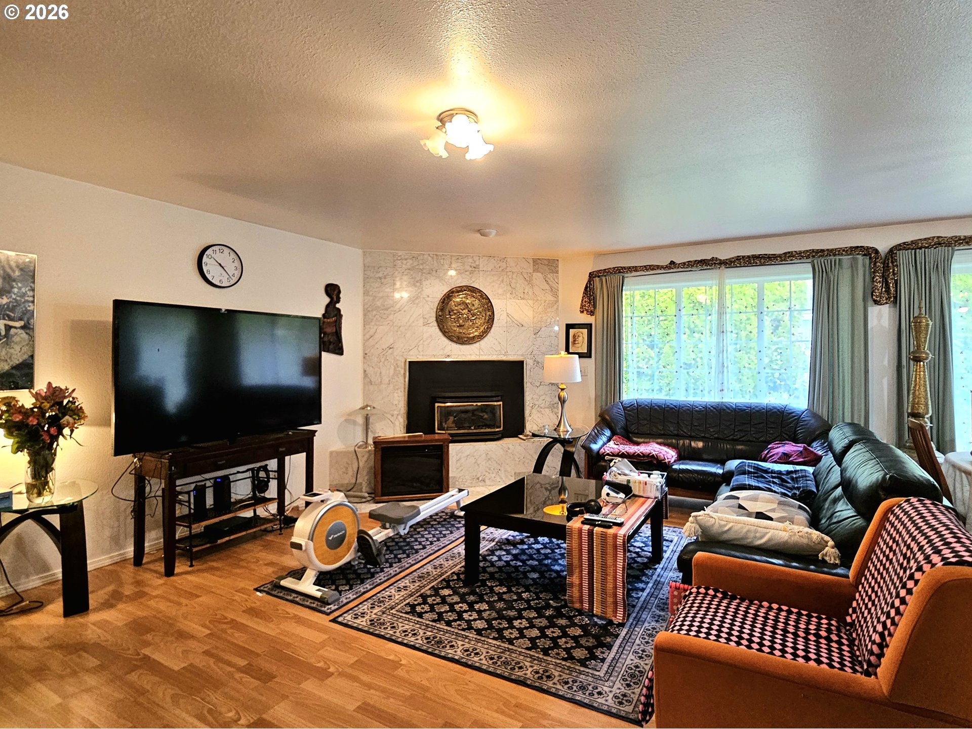 15482 Morrison Lane Brookings, OR 97415 - Photo 13 of 42 a living room with furniture and a flat screen tv