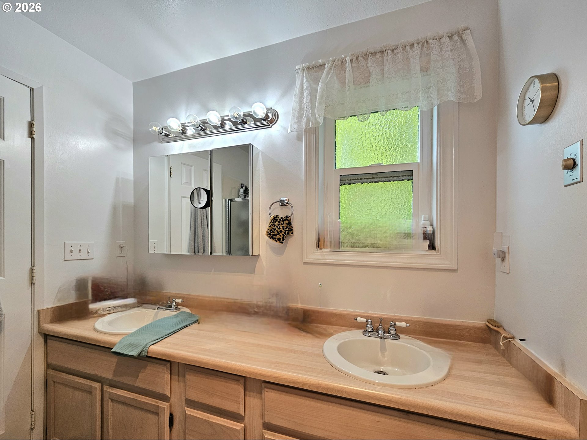15482 Morrison Lane Brookings, OR 97415 - Photo 23 of 42 a bathroom with a sink and a mirror
