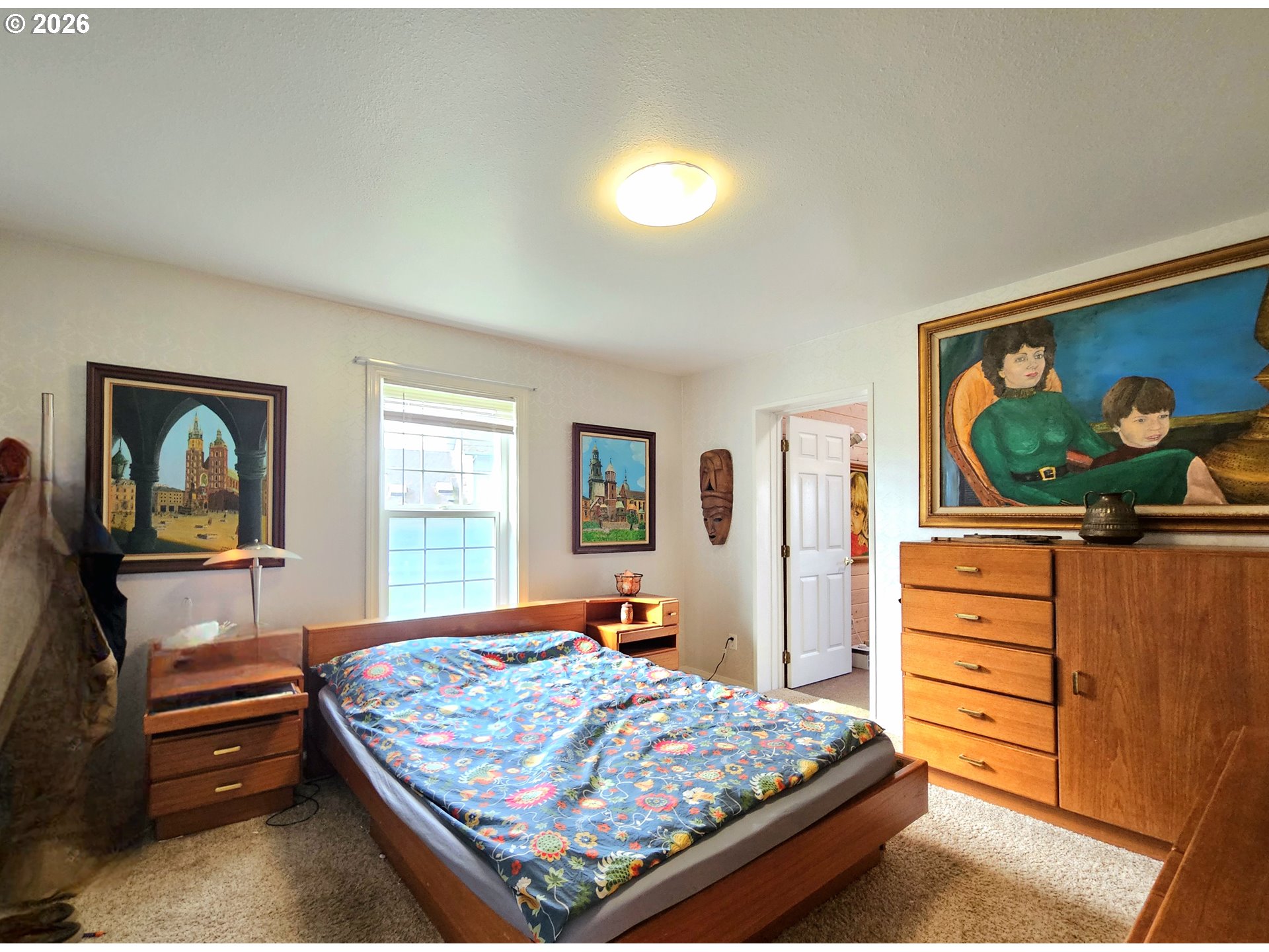 15482 Morrison Lane Brookings, OR 97415 - Photo 24 of 42 a bedroom with a bed and furniture