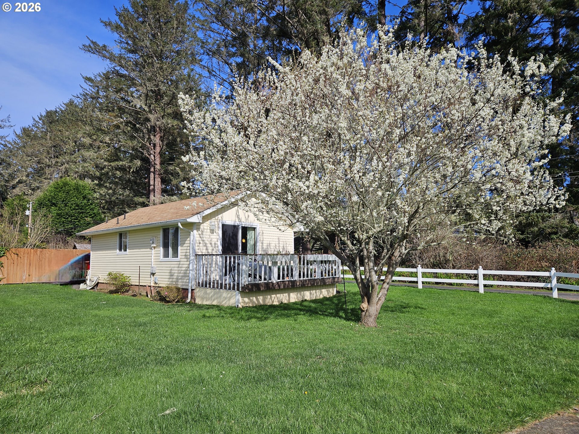 15482 Morrison Lane Brookings, OR 97415 - Photo 31 of 42 a front view of house with yard and green space