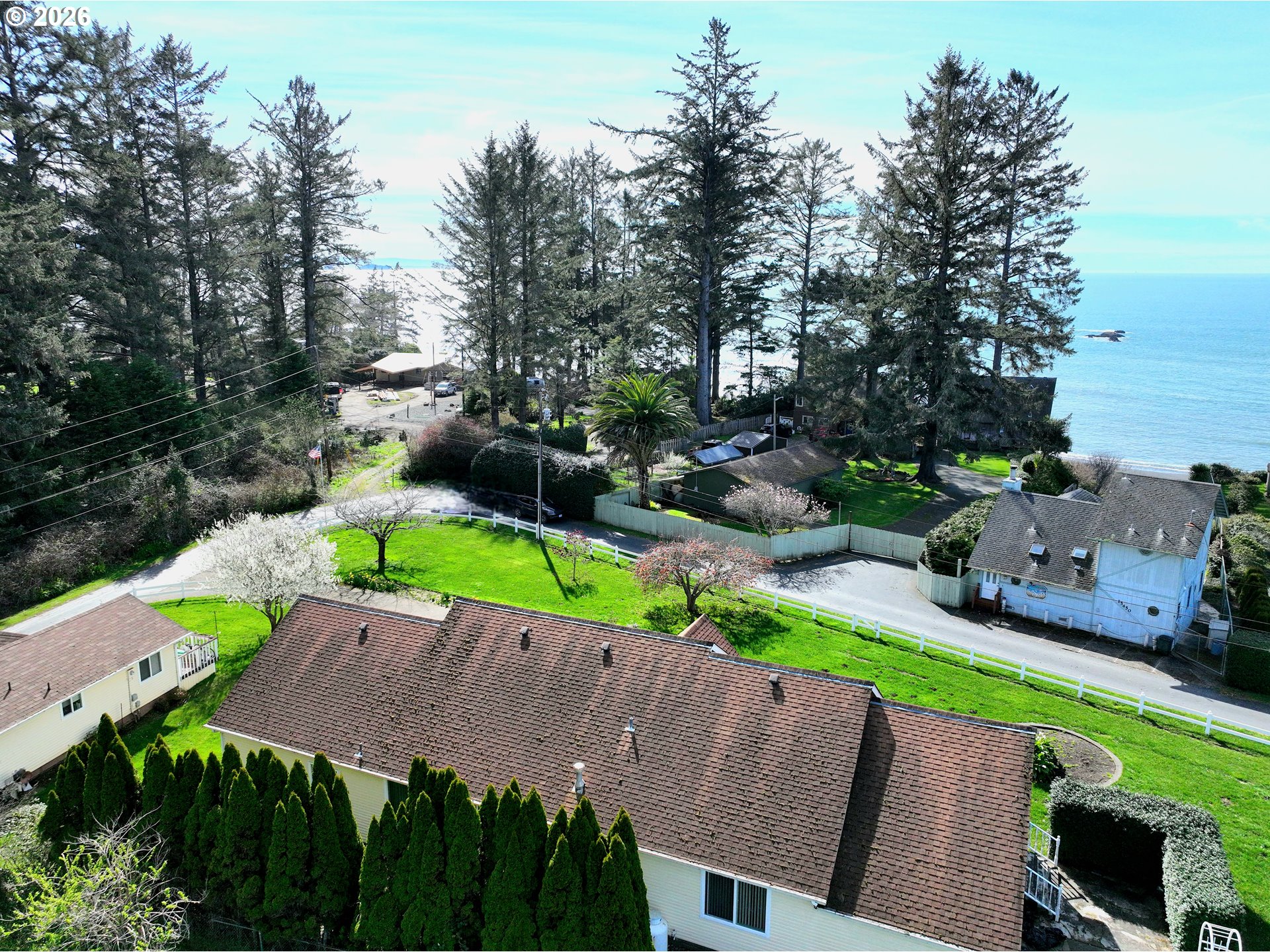 15482 Morrison Lane Brookings, OR 97415 - Photo 5 of 42 an aerial view of a house with garden space and street view