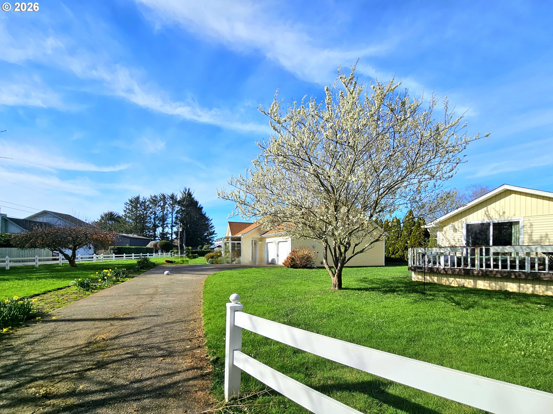 15482 Morrison Lane Brookings, OR 97415 - Photo 6 of 42 a view of a house with a yard