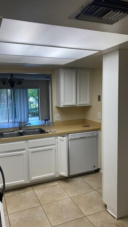 2516 South 19th Street, Unit 208 Fort Pierce, FL 34982 - Photo 7 of 15 a kitchen with granite countertop a sink and a stove