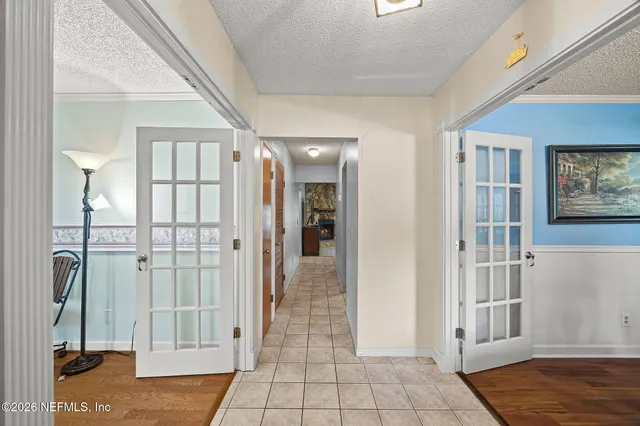 a view of a livingroom with furniture and lounge chair