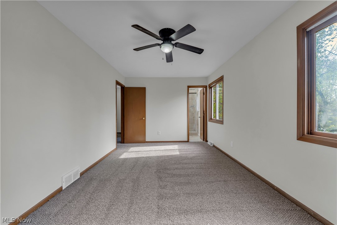 2540 Charney Road University Heights, OH 44118 - Photo 28 of 44 Neutral-toned walls complement a textured carpet flooring