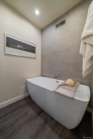 a bath tub sitting in a bathroom
