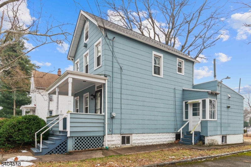 354 Hayward Street Orange, NJ 07050 - Photo 2 of 18 a view of a house with a yard